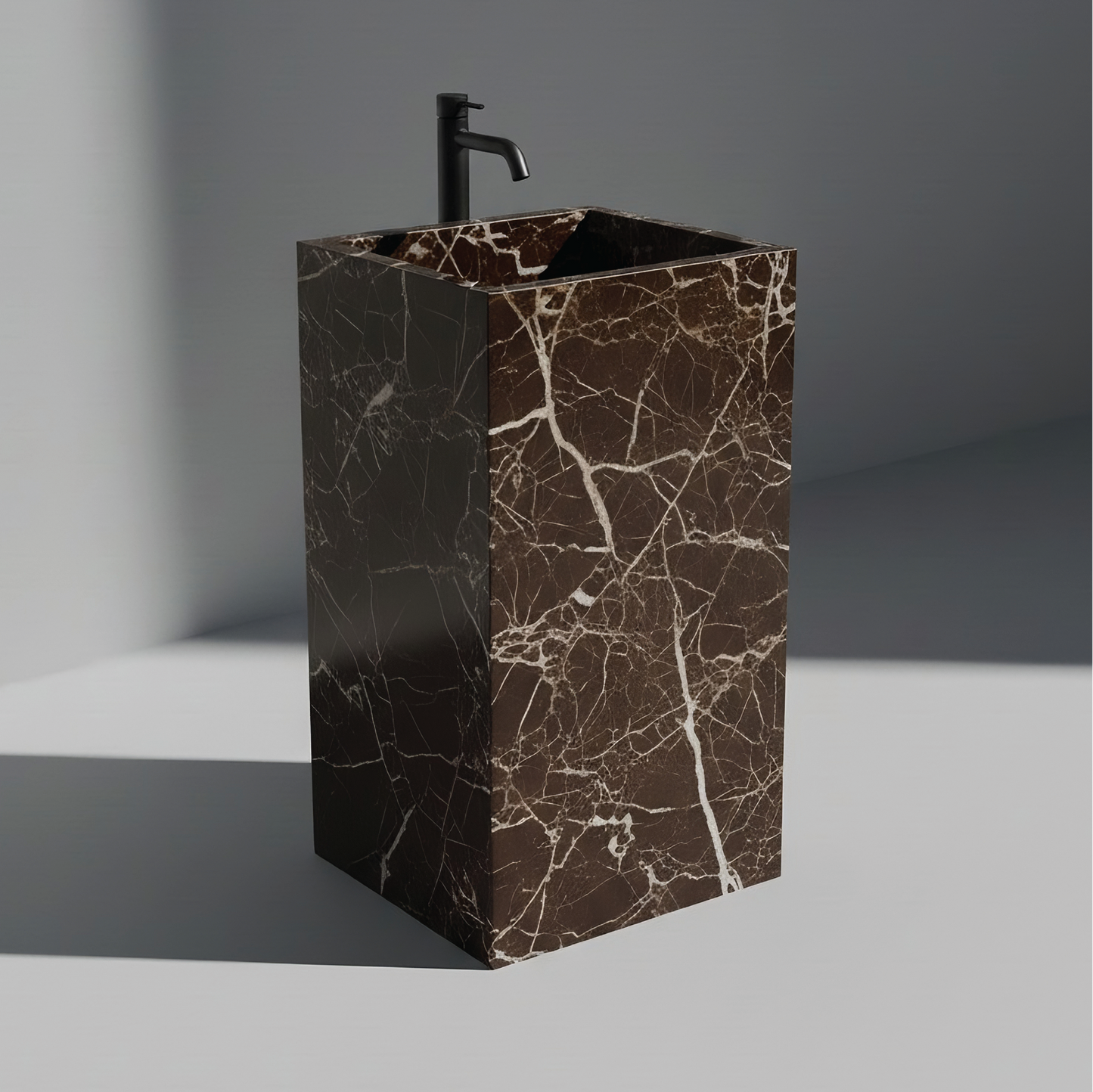 Lavabo Totem Seren en Mármol Emperador sin agujero, mármol marrón pulido con vetas claras naturales.