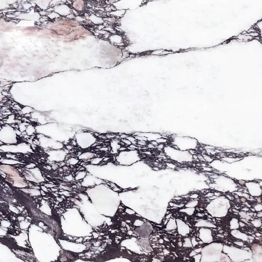 Calacatta Viola marble, polished finish with marked violet veins.