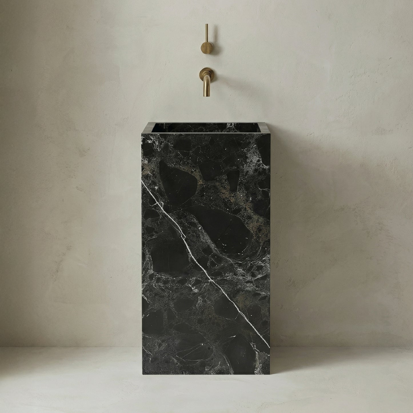 Lavabo Totem Seren en Mármol Negro Casper sin agujero para grifo, diseño monolítico de piedra natural para baños de lujo.