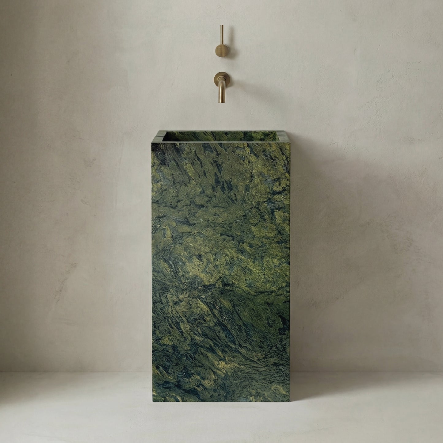 Lavabo Totem Seren en Cuarcita Verde Amazonia sin agujero para grifo, diseño monolítico de piedra natural.