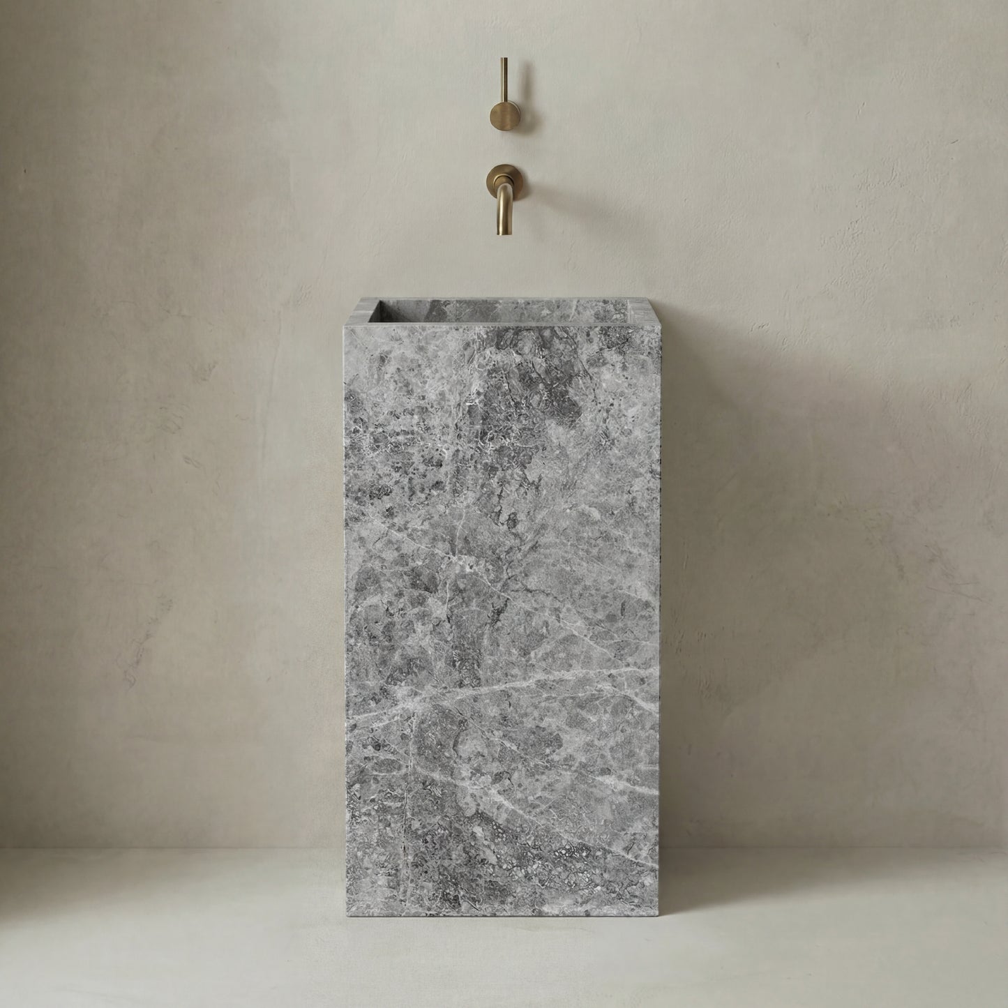 Lavabo Totem Seren en Mármol Tundra Grey sin agujero, acabado pulido de piedra natural gris.