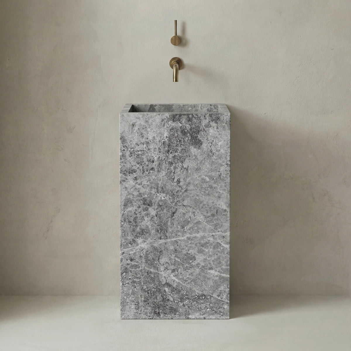 Totem Serene washbasin in Tundra Gray Marble without hole, polished gray natural stone finish.