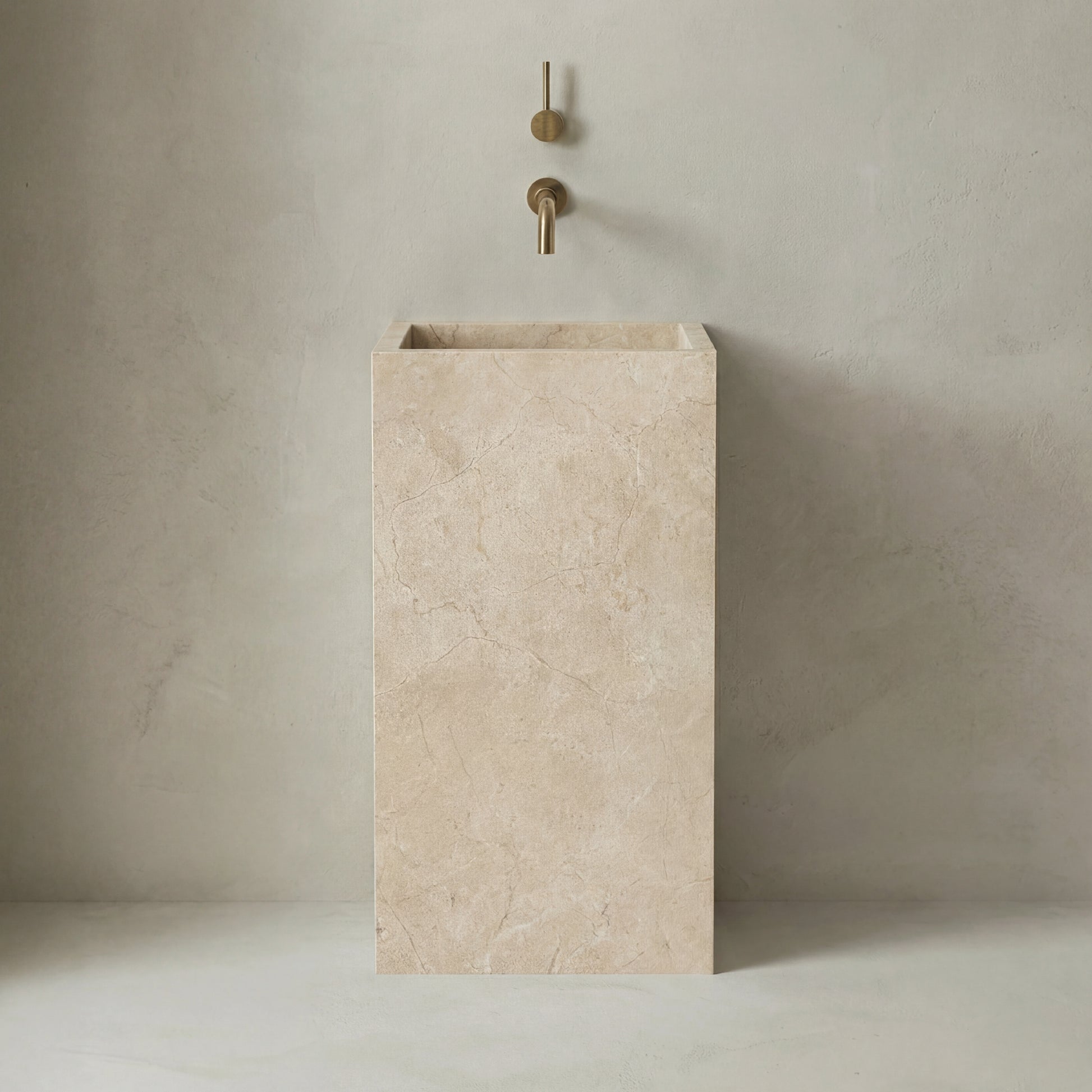 Lavabo Totem Seren en Mármol Crema Premium sin agujero, mármol beige pulido con vetas suaves.
