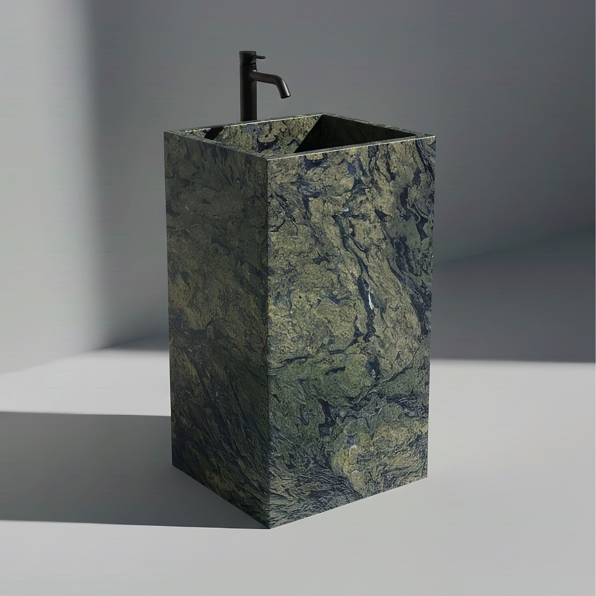 Lavabo Totem Seren en Cuarcita Verde Amazonia sin agujero para grifo, diseño monolítico de piedra natural.