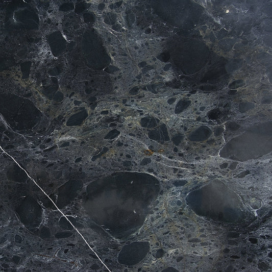 Detail of natural Casper Black Marble, gray veins on a black background, premium stone for luxury washbasins.