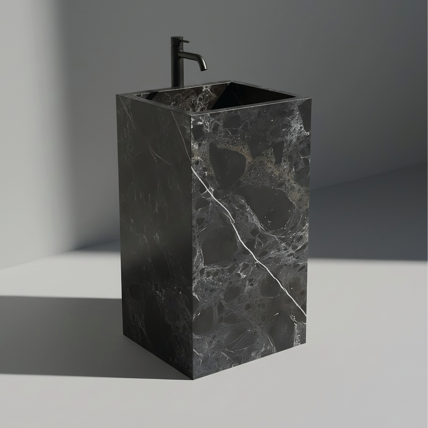 Lavabo Totem Seren en Mármol Negro Casper sin agujero para grifo, diseño monolítico de piedra natural para baños de lujo.