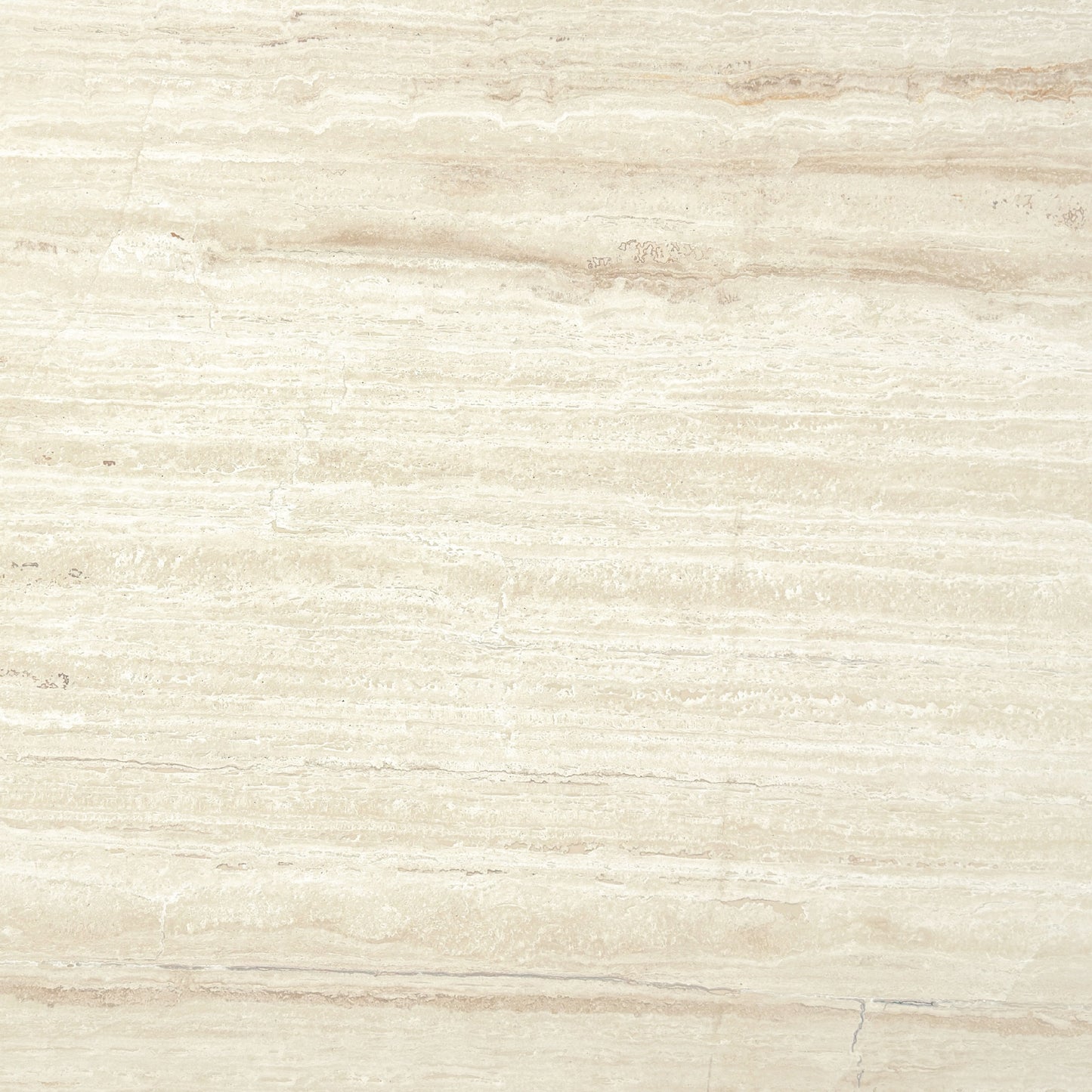 Detalle del Mármol Crema Premium, tonos beige y vetas claras en acabado pulido.