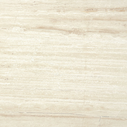 Detalle del Mármol Crema Premium, tonos beige y vetas claras en acabado pulido.