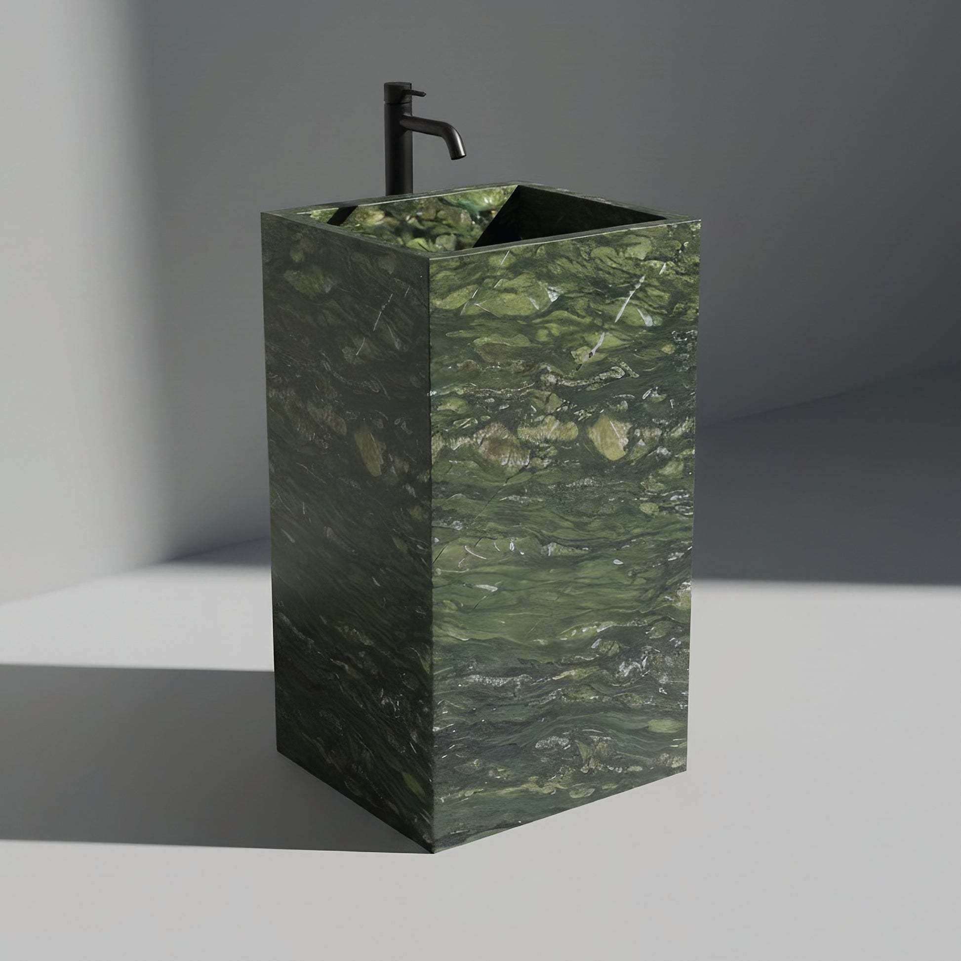 Lavabo Totem Seren en Cuarcita Verde Amazonia sin agujero para grifo, diseño monolítico de piedra natural.