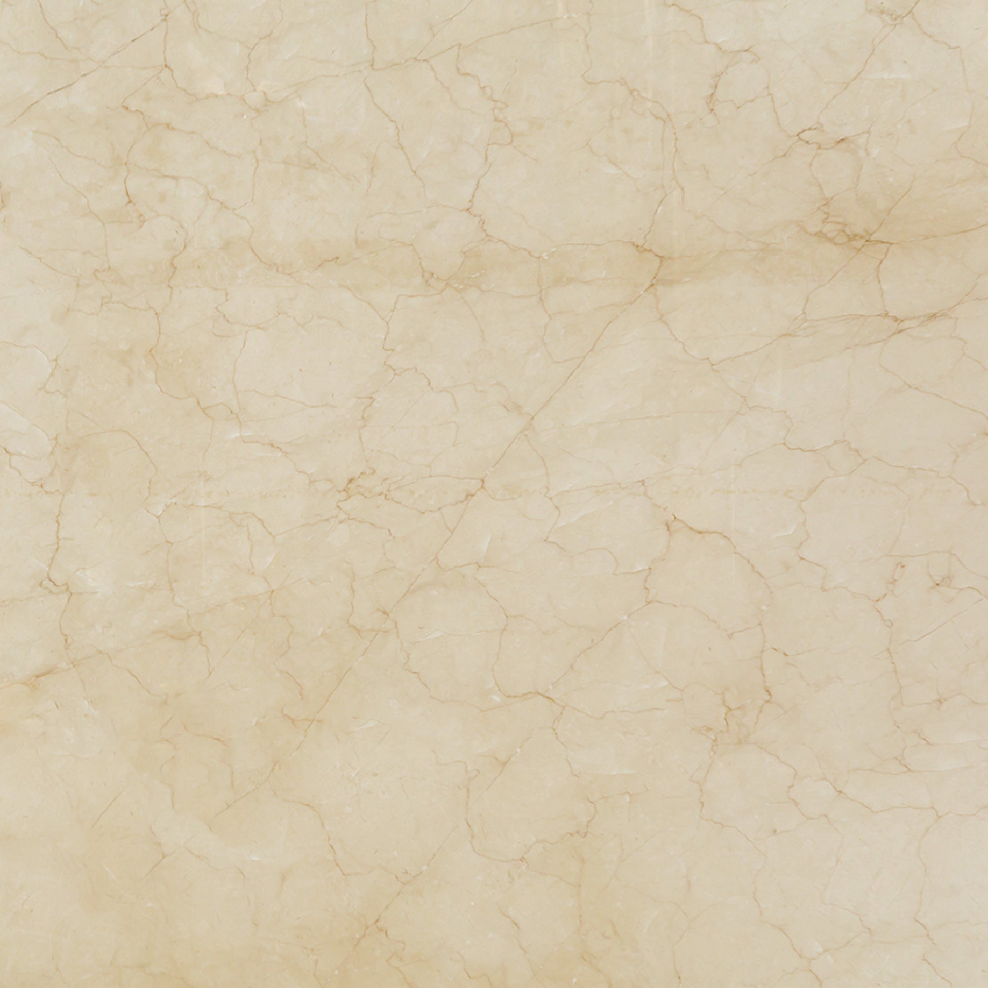 Detalle del mármol Crema Persa mostrando su textura natural, vetas cálidas y acabado pulido.