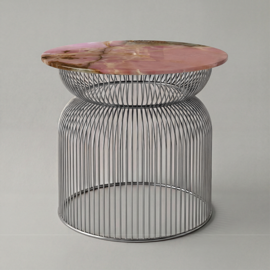 Mesa auxiliar Abcheck en ónix rosa natural con tonalidades suaves y diseño elegante