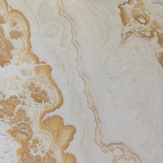Polished Mango Ivory onyx detail, natural stone veins, translucent texture on side table.