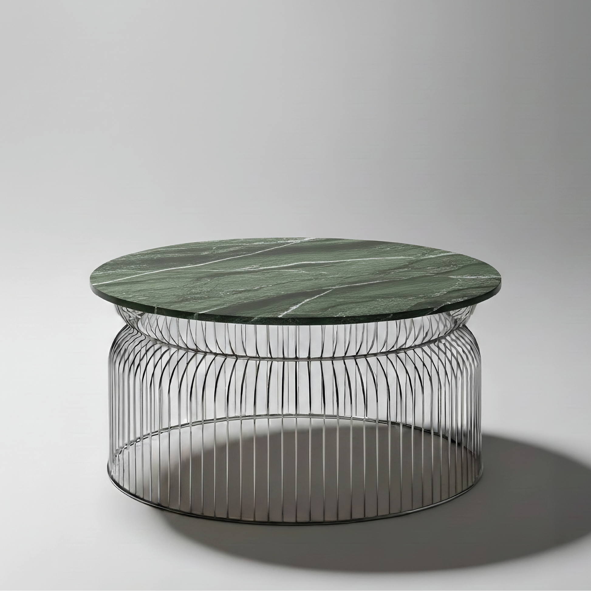 Mesa Centro Abcheck en Cuarcita Verde Amazonia con tablero de 1100 mm y base de 1000 mm.